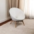 fotel młodzieżowy Patio kremowy, elegancki fotel welurowy, kremowy fotel z drewnianymi nóżkami, muszelkowy design fotela Patio, fotel kremowy do pokoju dziecka