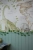 tapeta mapa świata dinozaury beżowa, mural edukacyjny z dinozaurami, tapeta geograficzna dla dzieci, tapeta prehistoryczna do pokoju dziecka, tapeta dinozaury vintage