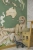 tapeta mapa świata dinozaury zielona, mural edukacyjny z dinozaurami, tapeta geograficzna dla dzieci, tapeta prehistoryczna do pokoju dziecka, tapeta dinozaury urban jungle