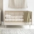 łóżeczko dziecięce 120x60 cm, łóżeczko szampańskie, łóżeczko Pinio Petite, stylowe łóżeczko do pokoju dziewczynki, łóżeczko z funkcją tapczanika, łóżeczko art déco, meble dla niemowląt w stylu glamour
