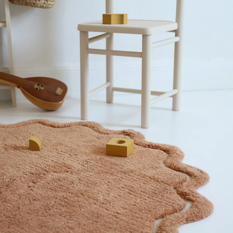 dywan dziecięcy okrągły karmelowy bawełniany 110 cm styl boho naturalny do pokoju dziewczynki lub chłopca