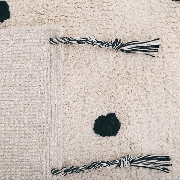 dywan dziecięcy Nümi Black 100x150 cm, bawełniany, tło ecru z czarnymi kropkami, miękki i prany w pralce