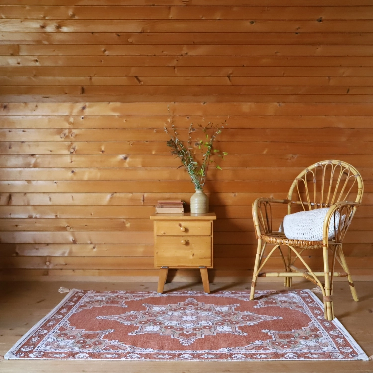 dywan dziecięcy boho prostokątny LALITHA bawełniany 100x150 cm z pomponami w kolorach siena nude i ecru