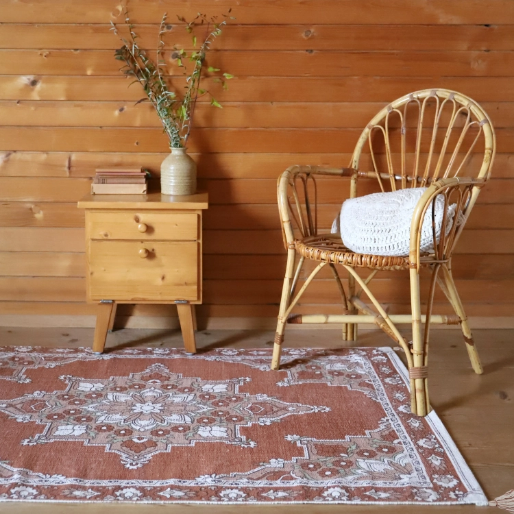 dywan dziecięcy boho prostokątny LALITHA bawełniany 100x150 cm z pomponami w kolorach siena nude i ecru