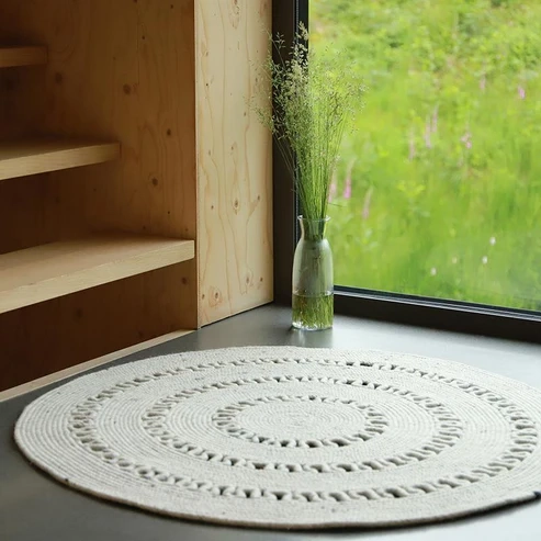 dywan okrągły naturalny ecru wełniany 140 cm ażurowy ręcznie robiony styl boho vintage do pokoju dziecka