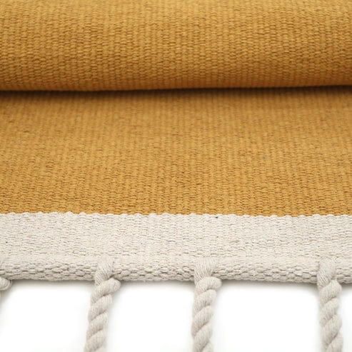 dywan prostokątny musztardowy i ecru bawełniany 100x150 cm do pokoju dziecięcego w stylu boho