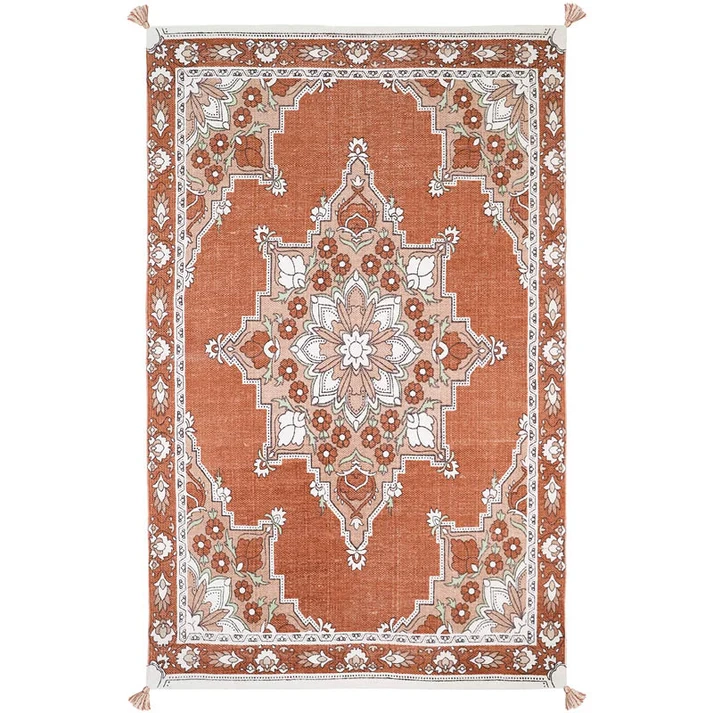 dywan dziecięcy boho prostokątny LALITHA bawełniany 100x150 cm z pomponami w kolorach siena nude i ecru