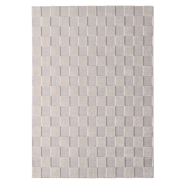 duży dywan dziecięcy 140x200 cm prostokątny w kolorze piaskowym z czarnymi kwadratami, strukturalny, nowoczesny styl