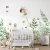 tapeta dziecięca Fairy Garden z wróżką na kwiatku, zielona łąka, stokrotki i motyle