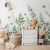tapeta dziecięca Fairy Garden z wróżką na kwiatku, zielona łąka, stokrotki i motyle