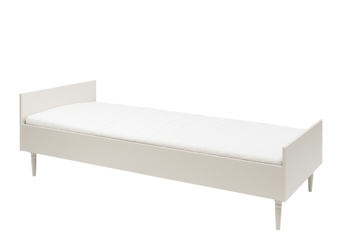 łóżko dziecięce Pinio Petite kaszmirowe 120×200 cm z naturalnymi bukowymi nóżkami