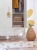 Trzydrzwiowa szafa Babushka w stylu retro, z przestrzenią na wieszaki, półkami i trzema szufladami. Funkcjonalna i stylowa szafa dziecięca od Wood Luck Design